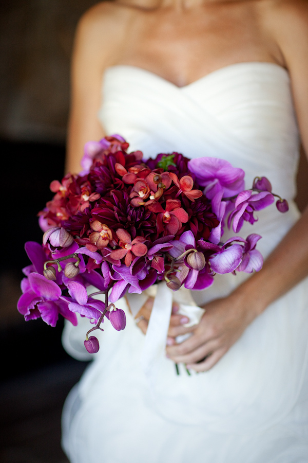 Beautiful bridal bouquet in purples and dark pinks - wedding photo by Catherine Hall Studios